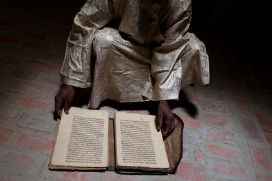 An ancient manuscript saved from destruction. Photo by Tyler Hicks / NYT
